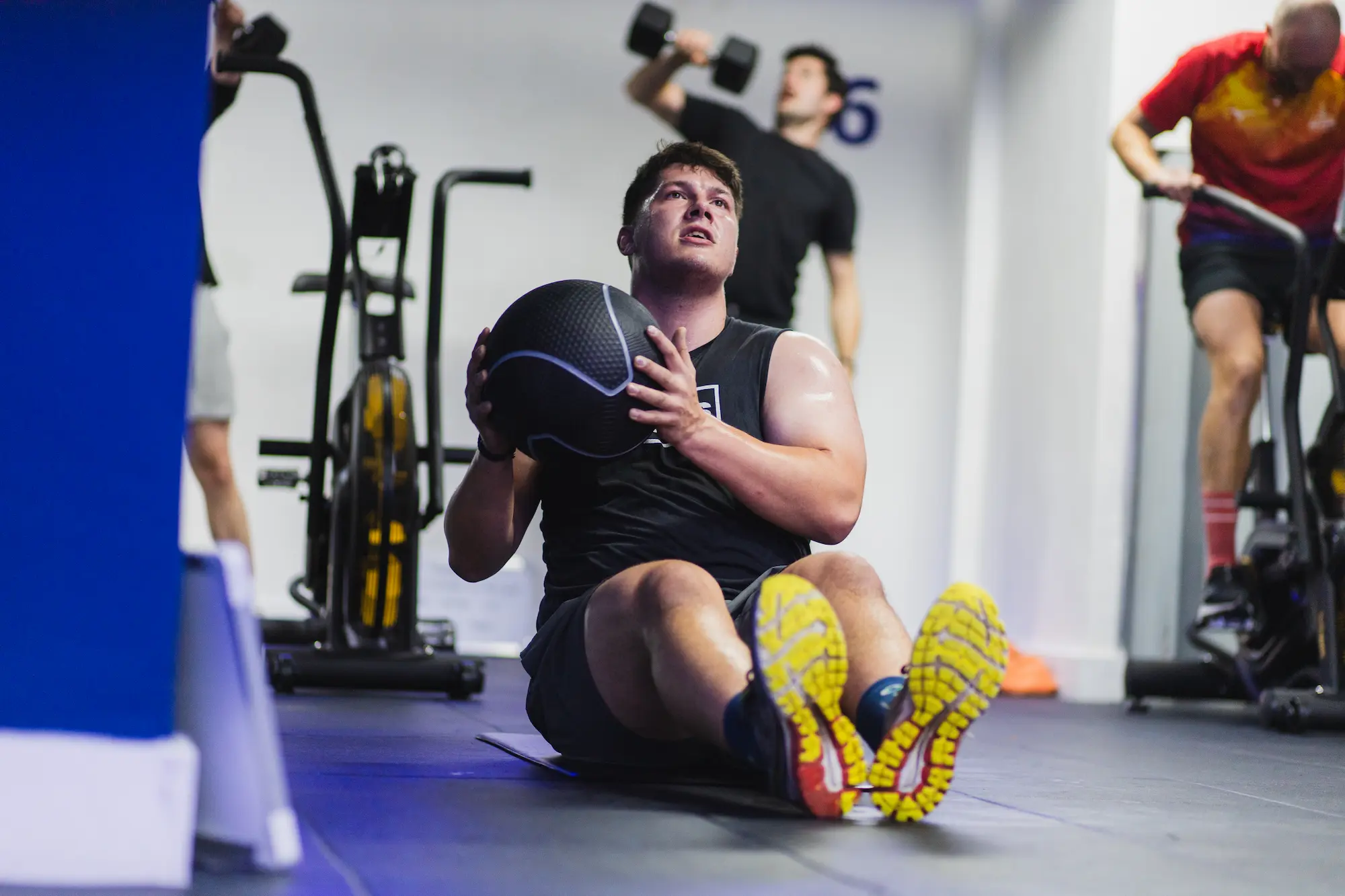 Man training with fitness ball